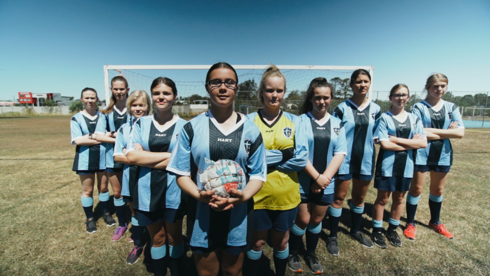 Cailyn Centre With Ball And Teammates Ready For Socktober